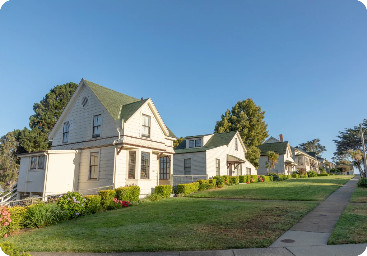 Row of vintage homes with green roofs